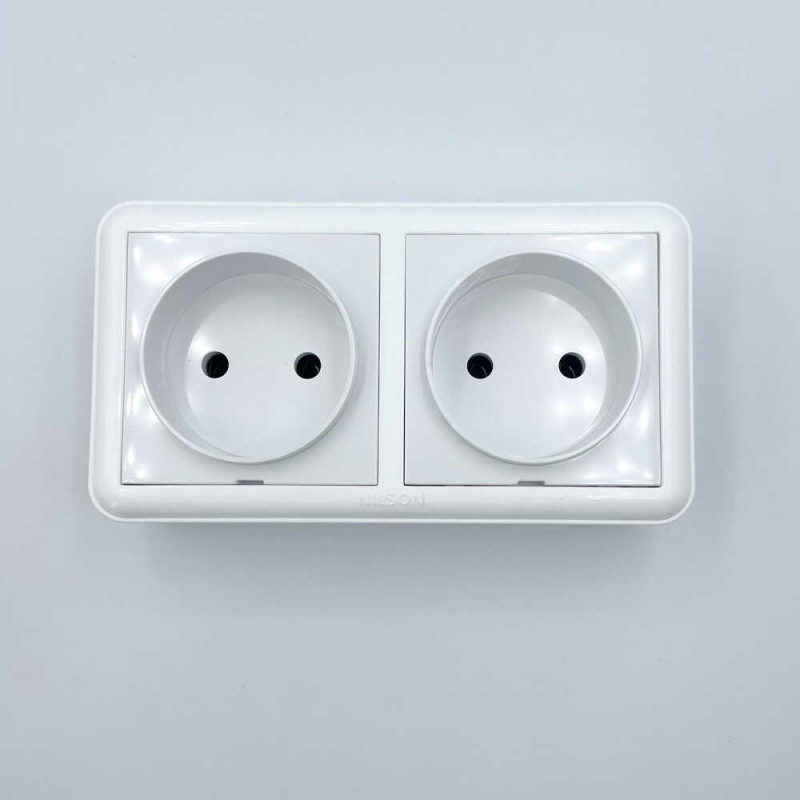 Розетка накладная Nilson Unique белая 2-я без заземления ( 28111024 )