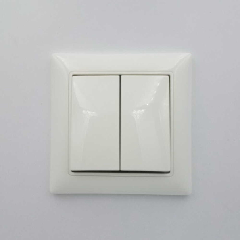 Выключатель Basic55 белый 2-кл (б/р) (2006/5 UC-94-507) 2CKA001012A2141