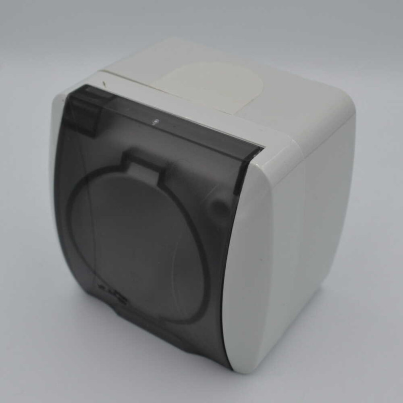 Розетка El-BI EVA одинарная с/з и крышкой накладная серая (554-011500-218)