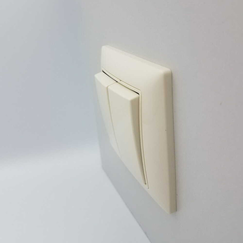 Вимикач  Basic55 сл.кість 2-кл (б/р) (2006/5 UC-92-507) 2CKA001012A2148