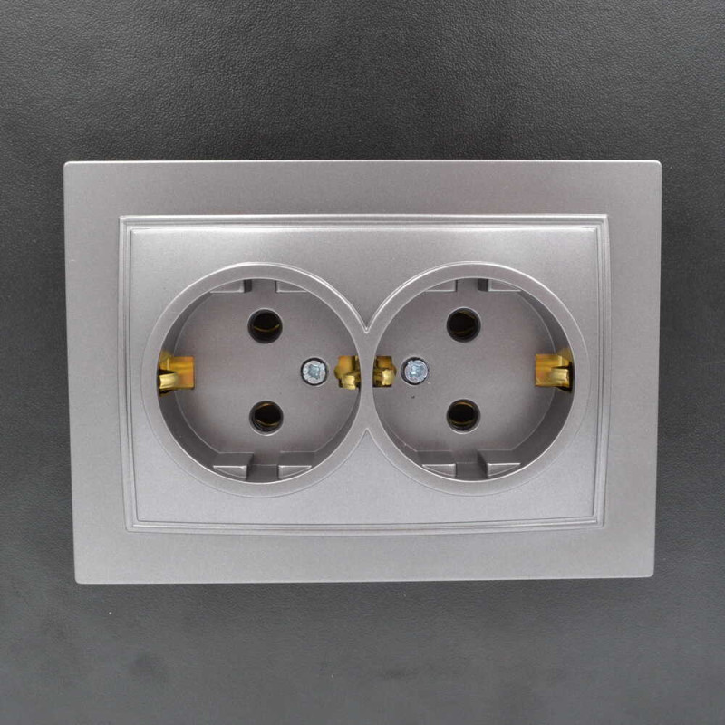 Розетка Nilson Thor серебро 2-я с заземлением ( 27131025 )