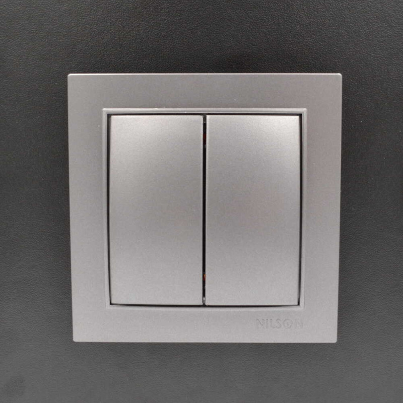 Вимикач Nilson Thor срібло 2кл ( 27131003 )